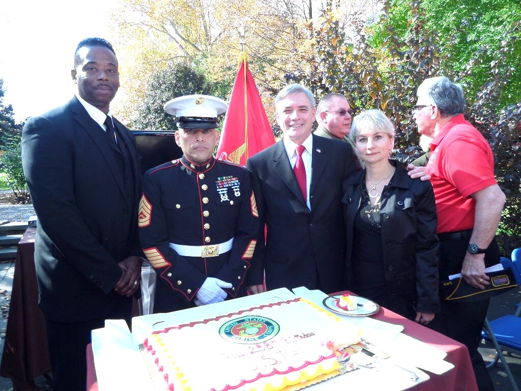 Nutley Gy Sgt Courtney Johnson, Gy Sgt. Monaco 'ret, Nutley Commissioner, speaker and honored guest Steve Rogers and his wife Natasha Roberts, in front of the cake. For article, enter "marines" in search box.
